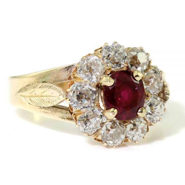 Antique Ruby and Old Cut Diamond Cluster Ring, R0.75ct D1.35ct, in 18ct yellow gold with delicate leaf detail to split shoulders