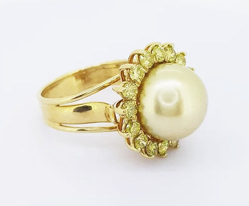 Golden South Sea Pearl and 2ct Fancy Yellow Diamond Cluster Ring; 13mm golden South Sea pearl set within a border of fancy yellow diamonds, 18ct yellow gold