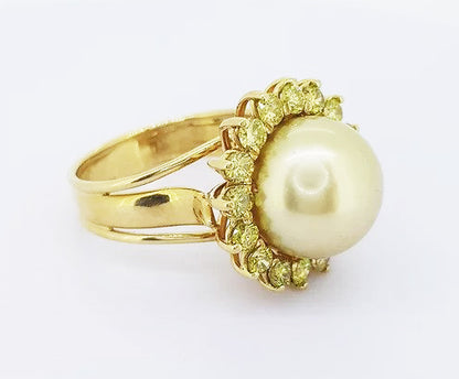 Golden South Sea Pearl and 2ct Fancy Yellow Diamond Cluster Ring; 13mm golden South Sea pearl set within a border of fancy yellow diamonds, 18ct yellow gold