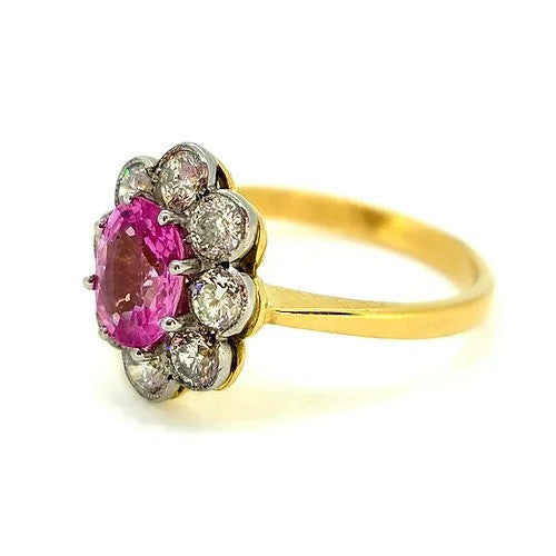 1.50ct Pink Sapphire and Diamond Floral Cluster Engagement Ring, oval pink sapphire surrounded by 1ct sparkling diamonds in timeless flower cluster design in 18ct yellow gold