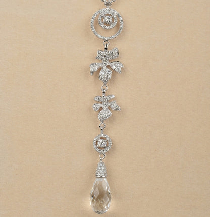 Diamond leaf pendant with faceted rock crystal drop