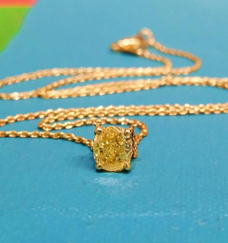 Fancy Yellow Diamond Pendant, 0.60 carats, 18ct Yellow Gold, Certified
