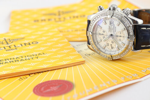 Breitling Chronomat Evolution Diamond 44mm Stainless Steel Automatic, A13356, white mother of pearl dial, factory set diamond hour markers and bezel, blue Breitling crocodile leather strap with Breitling buckle, With Breitling box and papers