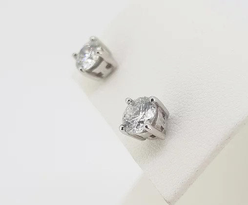 1.45ct Diamond Solitaire Stud Earrings; featuring round brilliant-cut diamonds, 1.45 carat total, 18ct white gold.