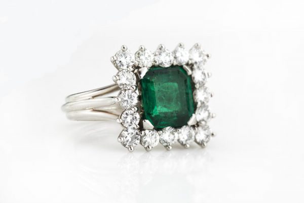 1.43 Natural Colombian Emerald and Diamond Square Cluster Ring; 1.43ct octagonal-cut emerald surrounded by 1.12cts diamonds, in 18ct white gold, with GCS Certificate