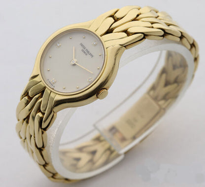 Patek Philippe La Flamme Ladies 18ct Yellow Gold 23mm Diamond Dial Quartz Watch, off-white/cream dial, four diamond hour markers, 18ct yellow gold bracelet with small fold-over clasp