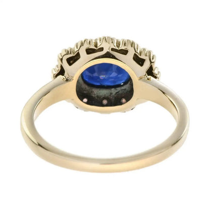 0.90ct Oval Sapphire and Opal Floral Cluster Ring