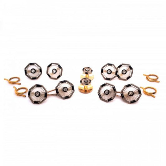 Antique Edwardian Old Cut Diamond, Rock Crystal, Onyx and Enamel Dress Set in platinum and gold; consisting of four buttons with separate split rings, a pair of cufflinks with white gold carabiner links and a pair of shirt studs, with screw fittings. Circa 1910. Stamped 18, with invoice number 176/10. Comes in an original Finnigans of New Bonds Street fitted case