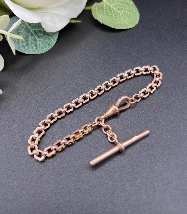 A fancy link rose gold bracelet with a T-bar and dog clip clasp