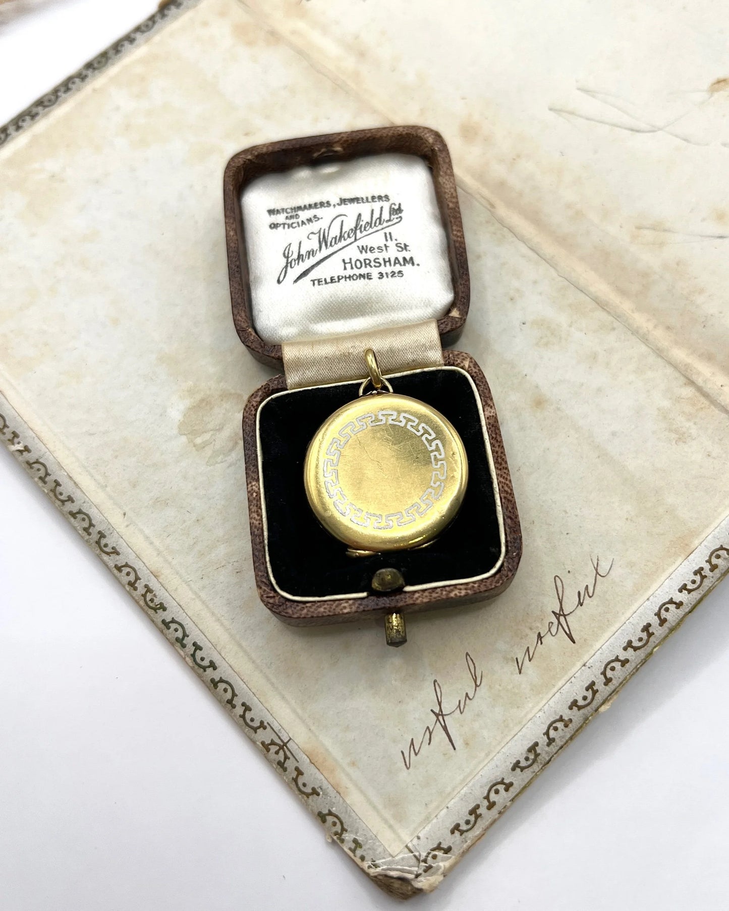 Antique 15ct Yellow Gold, Edwardian era Greek Key White Enamel Round Locket
