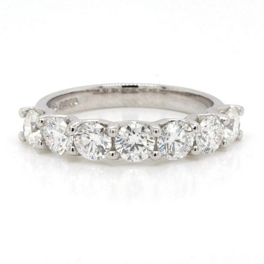 Diamond and Platinum Seven Stone Half Eternity Ring; platinum half eternity ring set with seven claw-set brilliant-cut diamonds, 1.45 carat total