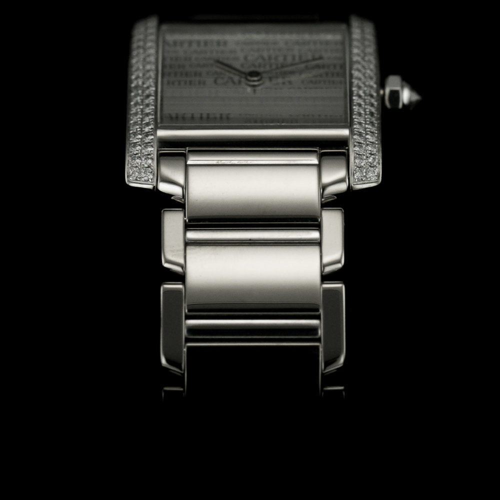 Cartier Tank Francaise 18ct White Gold WE101853 Factory Diamond Watch with factory set diamond case and limited production silver Cartier Boutique dial in original red Cartier box, with instruction booklet and stamped Cartier warranty papers dated 2010