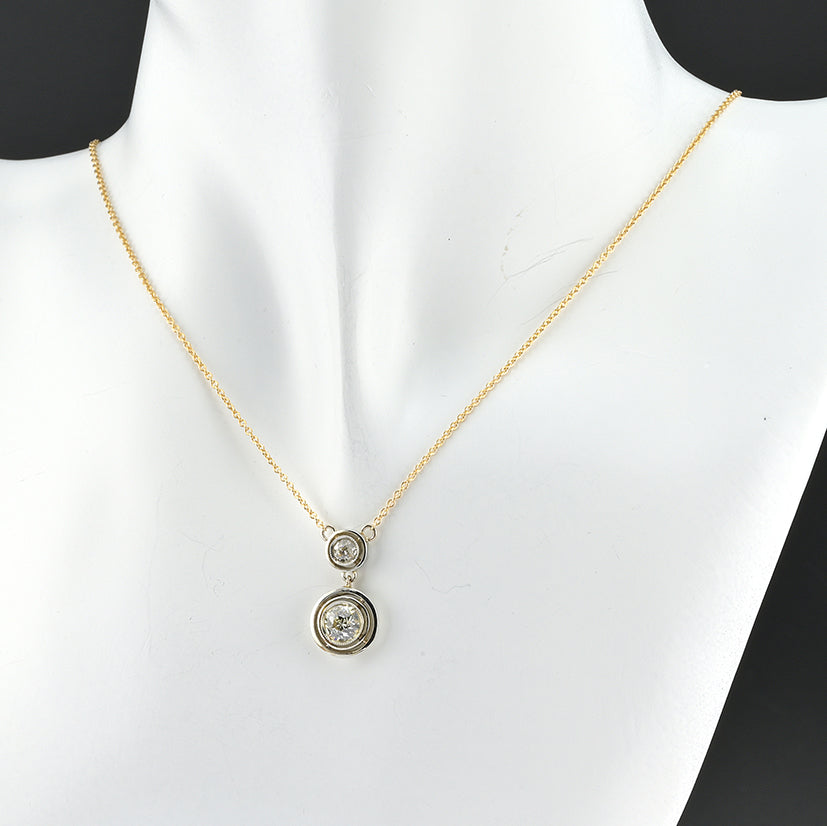 Art Deco 1.15ct Twin Old Cut Diamond Solitaire Target Pendant, 0.85ct old European-cut diamond topped with 0.30ct old mine-cut diamond in 18ct white gold target settings to fixed 18ct yellow gold trace chain