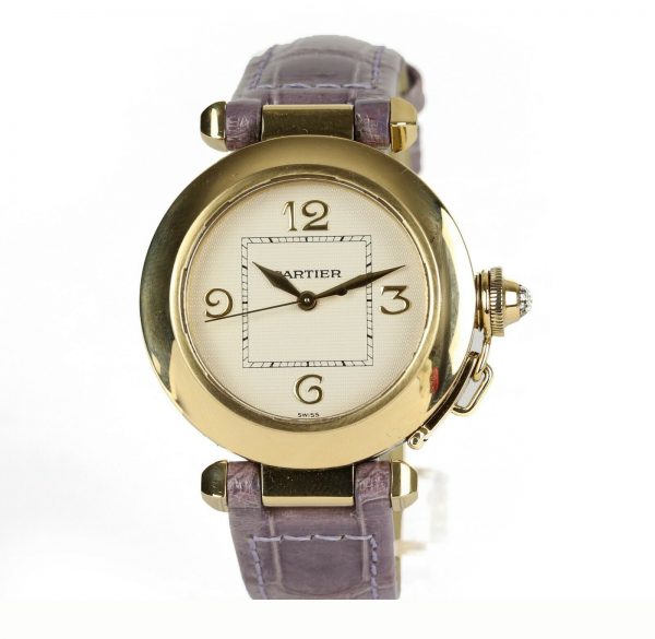 Cartier Pasha de Cartier 18ct Yellow Gold 2399 Ladies Automatic 32mm Wrist Watch With Removable Diamond Grill, white textured dial, Arabic numerals at 12, 3, 6 and 9 o'clock, sapphire crystal glass and a pavé set diamond crown cap. On a Cartier purple leather strap, with a Cartier 18ct yellow gold pin buckle.