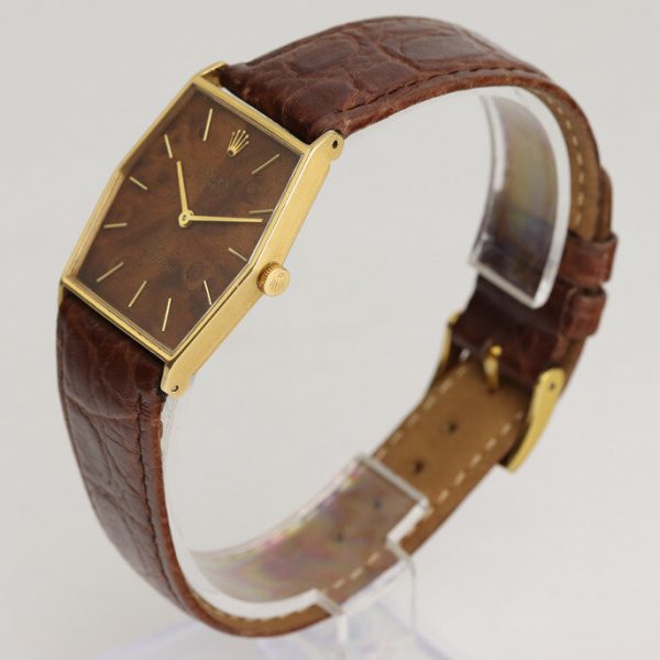 Rolex Cellini Vintage Wooden Dial 18ct Yellow Gold Manual Watch; with a unique wooden dial, on a brown crocodile strap with a Rolex pin buckle, Circa 1980s