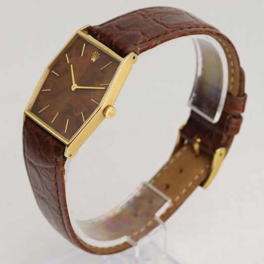 Rolex Cellini Vintage Wooden Dial 18ct Yellow Gold Manual Watch; with a unique wooden dial, on a brown crocodile strap with a Rolex pin buckle, Circa 1980s