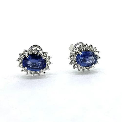 3.46ct Sapphire and Diamond Oval Cluster Stud Earrings; featuring 3.46 carats of oval faceted sapphires within 0.78cts diamond surrounds, in 18ct white gold