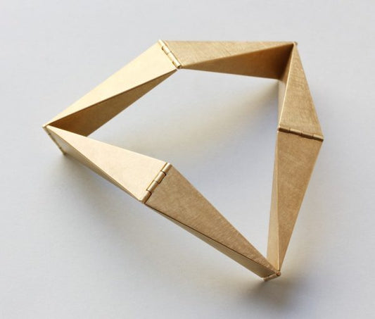 Contemporary 18ct Yellow Gold Geometric Bracelet; A geometrical design 18ct yellow gold bangle by Anne Roose Regenboog.