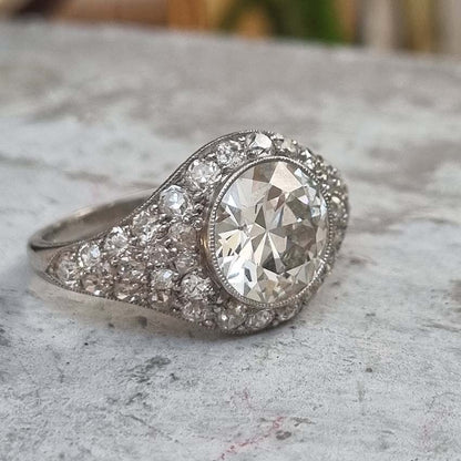 Art Deco 2.8ct Diamond Bombe Cluster Ring, 2.8ct old European transitional cut diamond in single-cut diamond encrusted domed surround in platinum