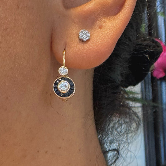 Target earrings on the ear sapphire and diamond 