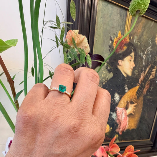 18 Carat Yellow Gold Step Cut Emerald 0.65 Carat and Diamond 0.10 Carat Ring