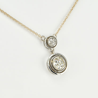 Art Deco 1.15ct Twin Old Cut Diamond Solitaire Target Pendant, 0.85ct old European-cut diamond topped with 0.30ct old mine-cut diamond in 18ct white gold target settings to fixed 18ct yellow gold trace chain