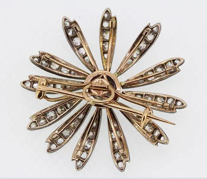 Antique Victorian 1.20ct Old Cut Diamond Daisy Flower Brooch; central 1.20 carat old-cut diamond, with diamond set petals, set in silver and backed with gold
