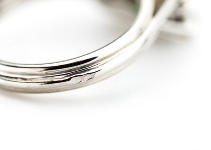 1.43 Natural Colombian Emerald and Diamond Square Cluster Ring; 1.43ct octagonal-cut emerald surrounded by 1.12cts diamonds, in 18ct white gold, with GCS Certificate