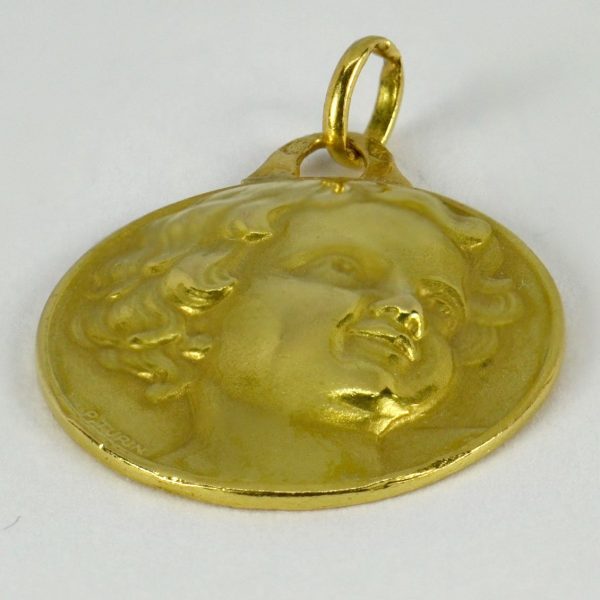 French Cherub 18ct Yellow Gold Charm Pendant; designed as a medal depicting a cherub’s head, Signed P. Turin