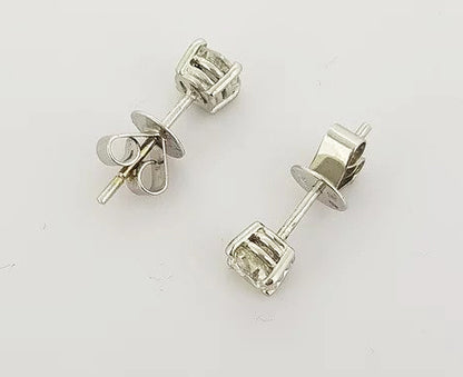 Pair of Diamond Stud Earrings, 0.97 carats, 18ct white gold. Diamond colour H, clarity SI1
