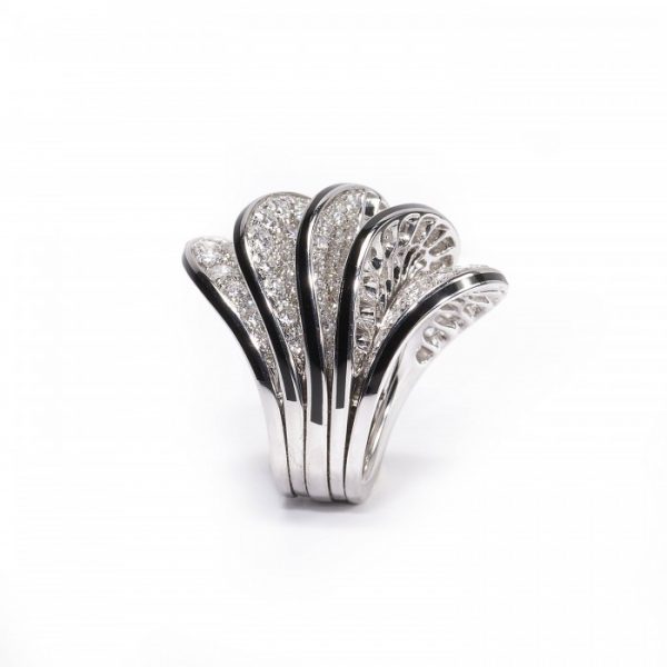 Cartier Paris Nouvelle Vague Diamond and Enamel Cocktail Ring; pavé set with 5.00 carats of round brilliant-cut diamonds in five wave-shaped formations, the edges with black enamel accents, in 18ct white gold, Signed