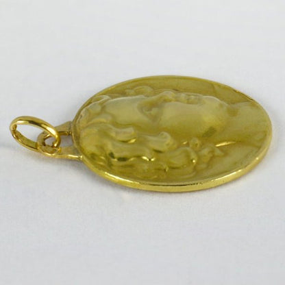 French Cherub 18ct Yellow Gold Charm Pendant; designed as a medal depicting a cherub’s head, Signed P. Turin
