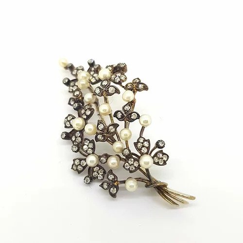 Natural Pearl and Diamond Spray Brooch; with certified natural saltwater pearls and leaves of diamonds, in silver and gold, with The Gem & Pearl Laboratory report