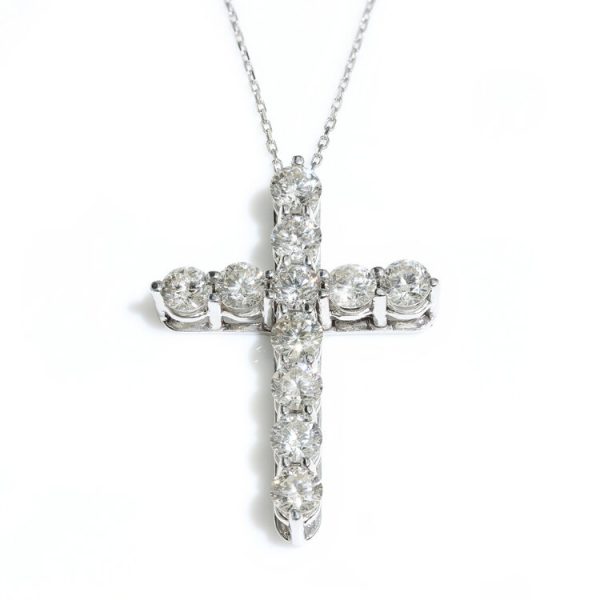 Tiffany and Co Diamond Cross Pendant; set with 11 round brilliant-cut diamonds totalling 2.20 carats, in 18ct white gold, with original box