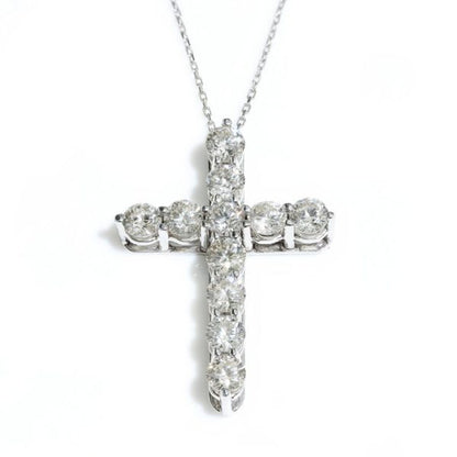 Tiffany and Co Diamond Cross Pendant; set with 11 round brilliant-cut diamonds totalling 2.20 carats, in 18ct white gold, with original box