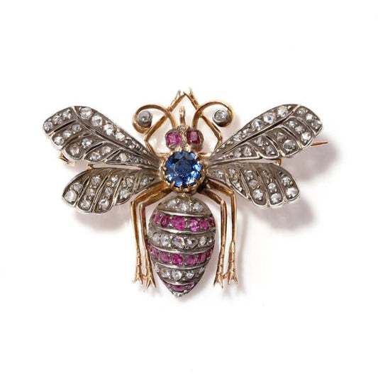 Antique Victorian Rose Cut Diamond, Ruby and Sapphire Insect Brooch; 19th century insect brooch with central 0.45ct blue sapphire accented with 1.48cts rose cut diamonds and 0.76cts rubies to the body, wings, eyes and antennae, in silver-upon-gold, Circa 1870s