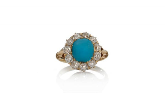 Antique Victorian Turquoise and Old Cut Diamond Cluster Ring; central 2.50ct round cabochon cut turquoise surrounded by 1.65cts old cut diamonds, in 15ct yellow gold, Circa 1870s