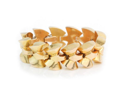 Vintage 1940s French Retro Fancy Link 18ct Yellow Gold Bracelet; comprising fancy links of a geometric bow design, with French owl hallmark for 18ct gold