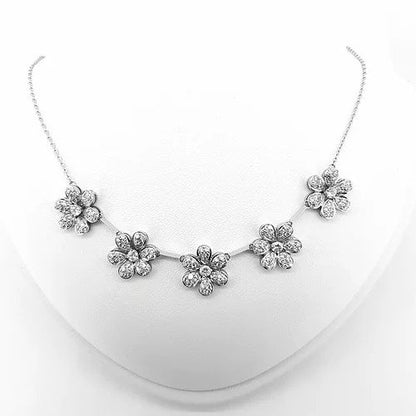 Diamond Daisy Flower Cluster Necklace; featuring five daisy flowers set with 3.75 carats of brilliant cut diamonds, in 18ct white gold