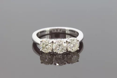 Three Stone Diamond Ring; classic diamond trilogy ring featuring three round brilliant-cut diamonds, 2.25 carat total, in 18ct white gold