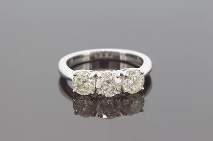 Three Stone Diamond Ring; classic diamond trilogy ring featuring three round brilliant-cut diamonds, 2.25 carat total, in 18ct white gold