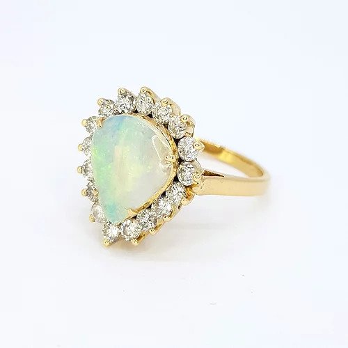 Cabochon Opal and Diamond Pear Shaped Cluster Ring