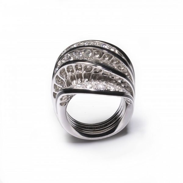 Cartier Paris Nouvelle Vague Diamond and Enamel Cocktail Ring; pavé set with 5.00 carats of round brilliant-cut diamonds in five wave-shaped formations, the edges with black enamel accents, in 18ct white gold, Signed