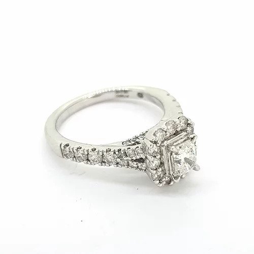 Princess Cut Diamond Cluster Ring; princess-cut diamond surrounded by a diamond halo, diamond set shoulders, 0.85 carat total, in platinum