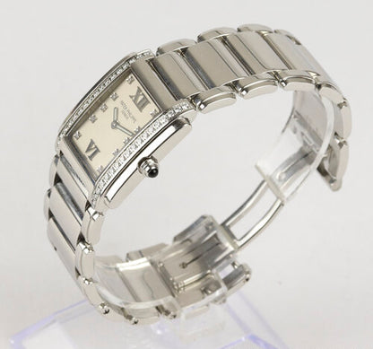 Patek Philippe Twenty-4 Stainless Steel 4910 Ladies 25mm Diamond Dial Quartz Rectangular Watch, white dial, diamond dot hour markers and Roman numerals, diamonds set to each side of the dial, blue cabochon gem set crown, Patek stainless steel bracelet with a hidden double deployment clasp.