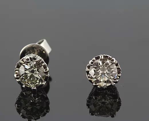 1.51ct Diamond and 18ct Gold Solitaire Stud Earrings; single-stone diamond studs featuring round diamonds totaling 1.51cts, four-claw set, 18ct white gold.