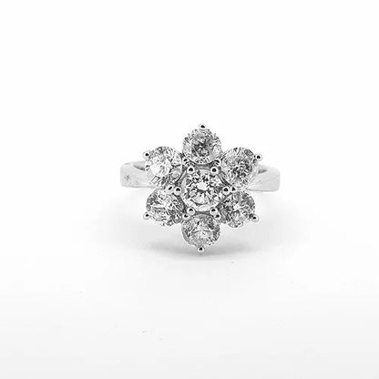 Diamond Flower Cluster Ring; classic seven stone claw set diamond cluster ring in a floral cluster design, 2.92 carats, in 18ct white gold