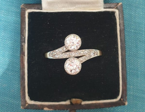Antique Edwardian Old Cut Diamond Two Stone Toi et Moi Ring, 1.20 carat total, two old European cut diamonds millegrain set in platinum with an 18ct rose gold shank