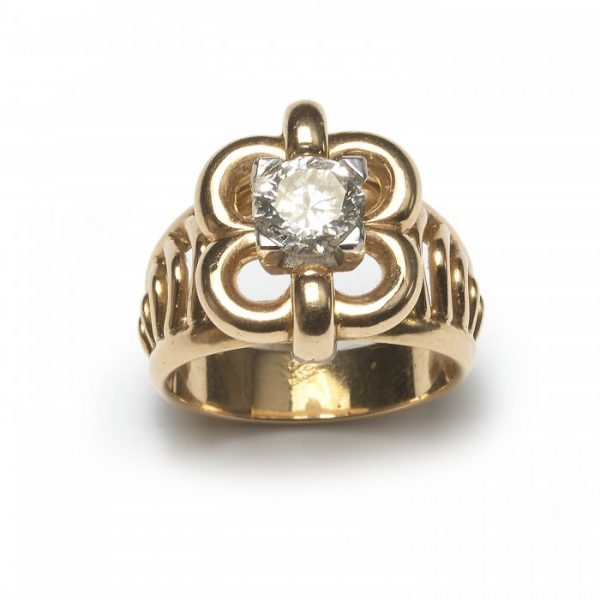 Vintage French 0.91ct Diamond Solitaire Dress Ring; single round brilliant-cut diamond, claw set within open floral frame with cut-out shoulders, in yellow gold, Circa 1950