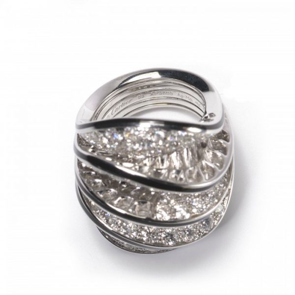 Cartier Paris Nouvelle Vague Diamond and Enamel Cocktail Ring; pavé set with 5.00 carats of round brilliant-cut diamonds in five wave-shaped formations, the edges with black enamel accents, in 18ct white gold, Signed